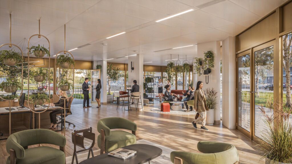 Moderne en groene kantoorruimte aan de H.J.E. Wenckebachweg met werkplekken, loungegedeelte en grote ramen.
